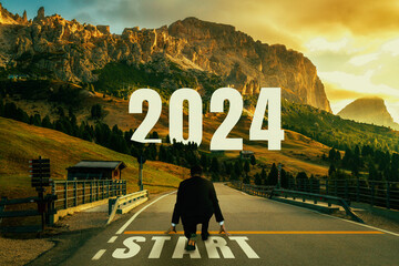 2024 New Year journey and future vision concept . Businessman traveling on highway road leading...