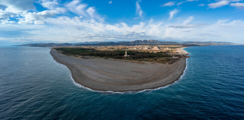 drone landscape view of Punta Alice beach and lighthouse in Calabria