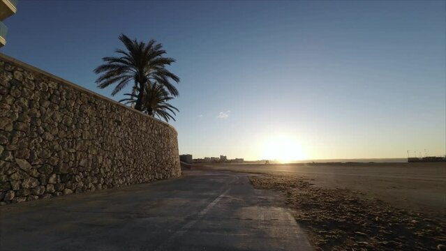 Pov Morning sunrise bike ride in Can Pastilla beach, Palma de Mallorca