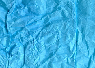 Sky blue crumpled paper texture. Serene azure backdrop. Dreamy blue textured sheet. Heavenly stationery background. Pale celestial matte paper.