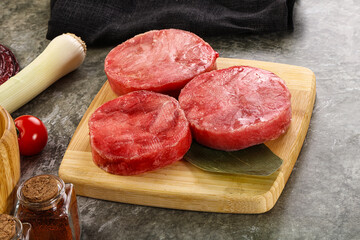 Delicous raw tuna medallion for cooking