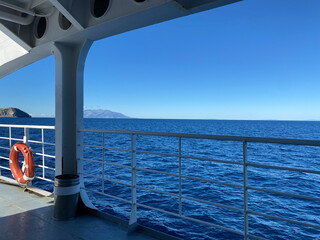 Fototapeta na wymiar View from the deck of a cruise ship to the island of Gokceada (Imbros). Canakkale, Turkey