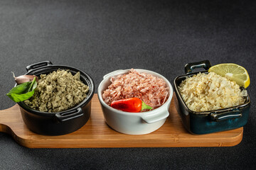 Set of spicy herbs and salt on a dark background. top view. copy space for text