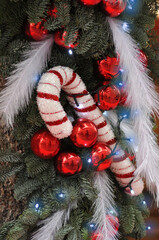 Christmas umbrella hanging with balls on Christmas pine branches © ajcsm