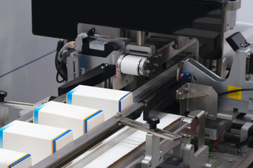 Automatic packaging conveyor line in pharmaceutical factory, pharmaceutical industrial concept...