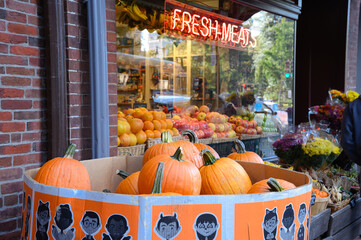 pumpkins for sale in a market