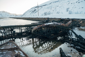 Abandoned old rusty ship in the north. Graveyard of ships at sea