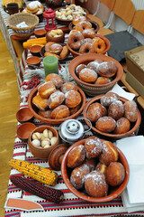 Festive dessert with donuts on a christmas table. Ukrainian holy evening.