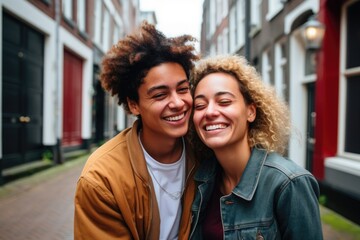 Portrait of a happy young couple on the street