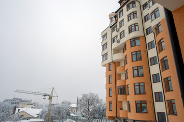 Fototapeta premium Newly built houses. Modern urban architecture. A group of newly built houses. Residential complex. Campus. Real estate.