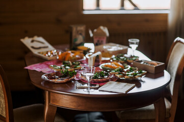 Food, drinks, dishes stand on a wooden table in a restaurant, cafe. Photography, romantic dinner.