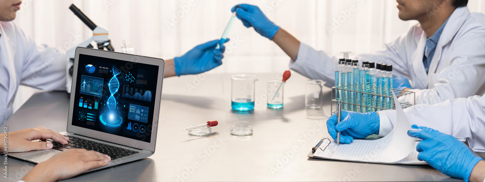 Poster dedicated scientist group working on advance biotechnology computer software to study or analyze dna
