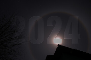 2024 against the backdrop of a celestial halo in the sky over Ukraine at night in the city of...