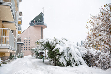 A street in Krakow is covered with snow after a blizzard in winter.