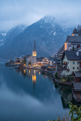 Fototapeta na wymiar Great promotional photos of Austrian dream town Hallstatt landscapes with fantastic sunset colors and clouds in winter season