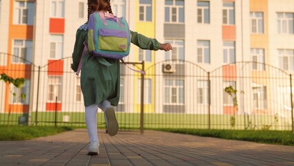 student. little child kid daughter girl runs school backpack. happy family. children's run....