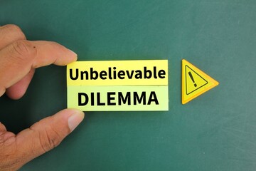 exclamation mark and colored paper with the word Unbelievable dilemma