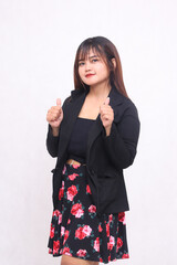 Beautiful Asian Indonesian girl in a casual professional office skirt, cheerful, crooked right...