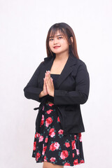Beautiful Asian Indonesian girl in a casual professional office skirt, cheerful, crooked right...