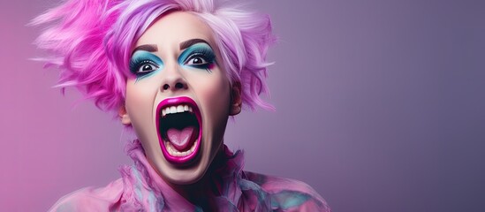 Terrifying Halloween clown makeup: woman with intense eyes, screaming with pink-painted mouth, and purple hair.