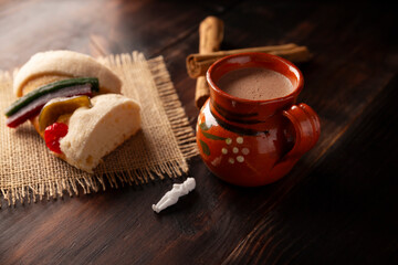 Traditional Kings day cake also called Rosca de Reyes, roscon, Epiphany Cake and with a clay...
