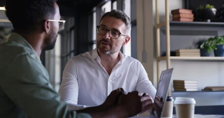 Business men, mentor collaboration and laptop with web design management and communication at desk. Teamwork, staff and digital graphic discussion in a office with professional employee and planning - Powered by Adobe