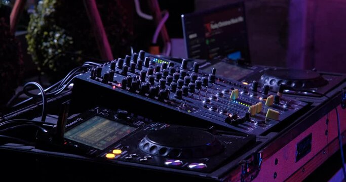 A DJ sound mixing board