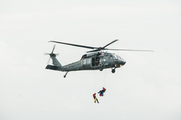 Fototapeta na wymiar air show in Mielec, Blackhawk in rescue operation