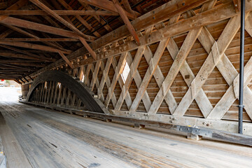 Interior image of historic timber one lane covered bridge in the Town of Newfield, Tompkins County NY.	