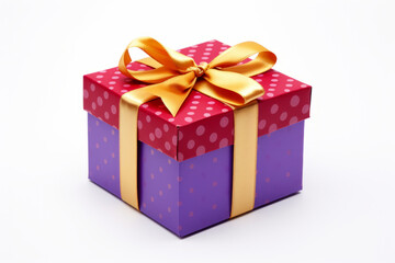 Fototapeta premium A multi-colored gift box wrapped with ribbon, isolated on a solid white background