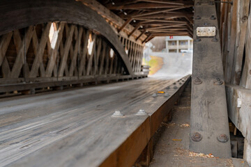Obraz premium Interior image of historic timber one lane covered bridge in the Town of Newfield, Tompkins County NY. 