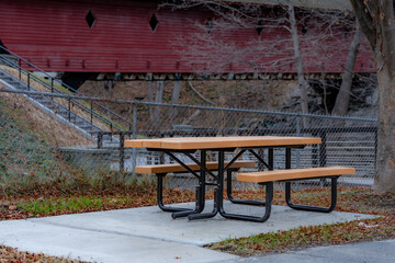 ADA Wheelchair accessible picnic table with concrete surface.
