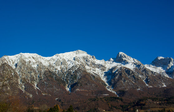The first snow in the mountains of Alpago in the province of Belluno Italy