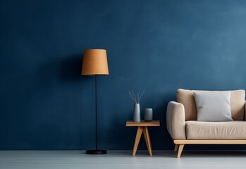 Dark blue wall background of modern living room with beige color single sofa, table, and a lamp....
