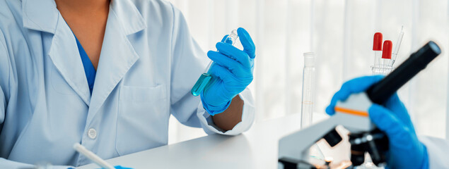 Laboratory researcher team advance healthcare with scientific expertise and laboratory equipment,...