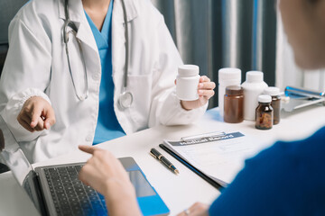 patient filling insurance legal document at appointment with doctor. patient signing medical...