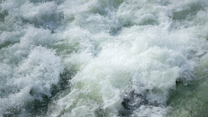 Severe water with turbulence flow and splashing due to heavy weather condition. Nature...
