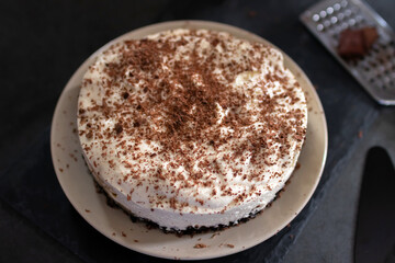Classic banoffee pie a simple cookie crust is filled with thick caramel, slices of fresh banana and whipped cream on top. 
