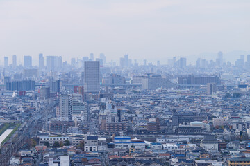Fototapeta na wymiar Overhead view of the city of Osaka, Japan, seen from a high hill