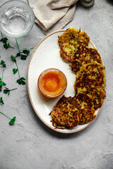 Zucchini pancakes with pike caviar