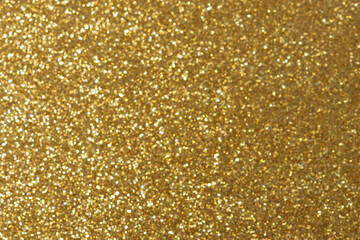 Abstract Christmas Golden background with bokeh. Festive bright and Sunny with a defocused...