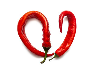 Two curved pods of red hot chili pepper