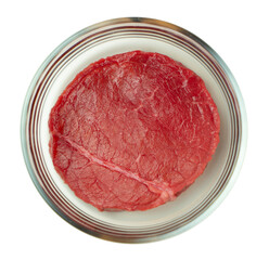 Synthetic meat, cultivated meat isolated on white background, cellular agriculture, cultured meat in a circular glass container