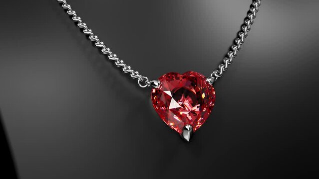 White gold necklace with a red heart-shaped gemstone on a black stand. 3d animation
