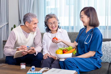 Senior couple get medical advice visit from caregiver nutritionist at home while having suggestion on fresh vegetable meal for healthy eating on probiotic and better digesting system