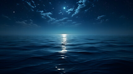 Fototapeta na wymiar Moonlight reflecting on the calm ocean surface at night.