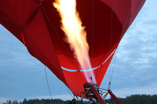 A propane gas burner fills the hot air balloon of the Montgolfier brothers with hot air.