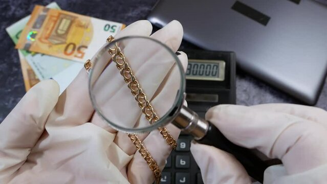 golden chain, digital camera and money, laptop, store selling photographic equipment, pawnshop, closeup