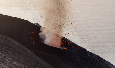 smoke from the erupting volcano on the island of Stromboli