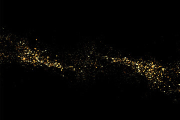 Fototapeta na wymiar Scattered golden particles on a dark background. Festive background or design element.